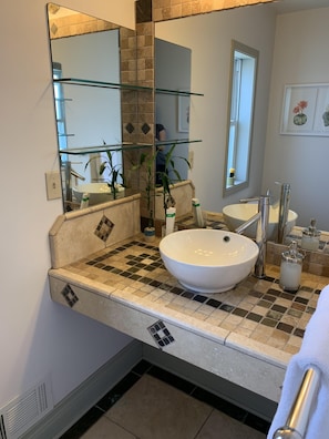 Combined shower/tub, hair dryer, towels, soap