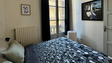 1 slaapkamer, een strijkplank/strijkijzer, gratis wifi, beddengoed