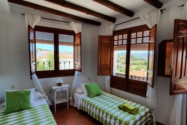 4 slaapkamers, een strijkplank/strijkijzer, wifi, beddengoed