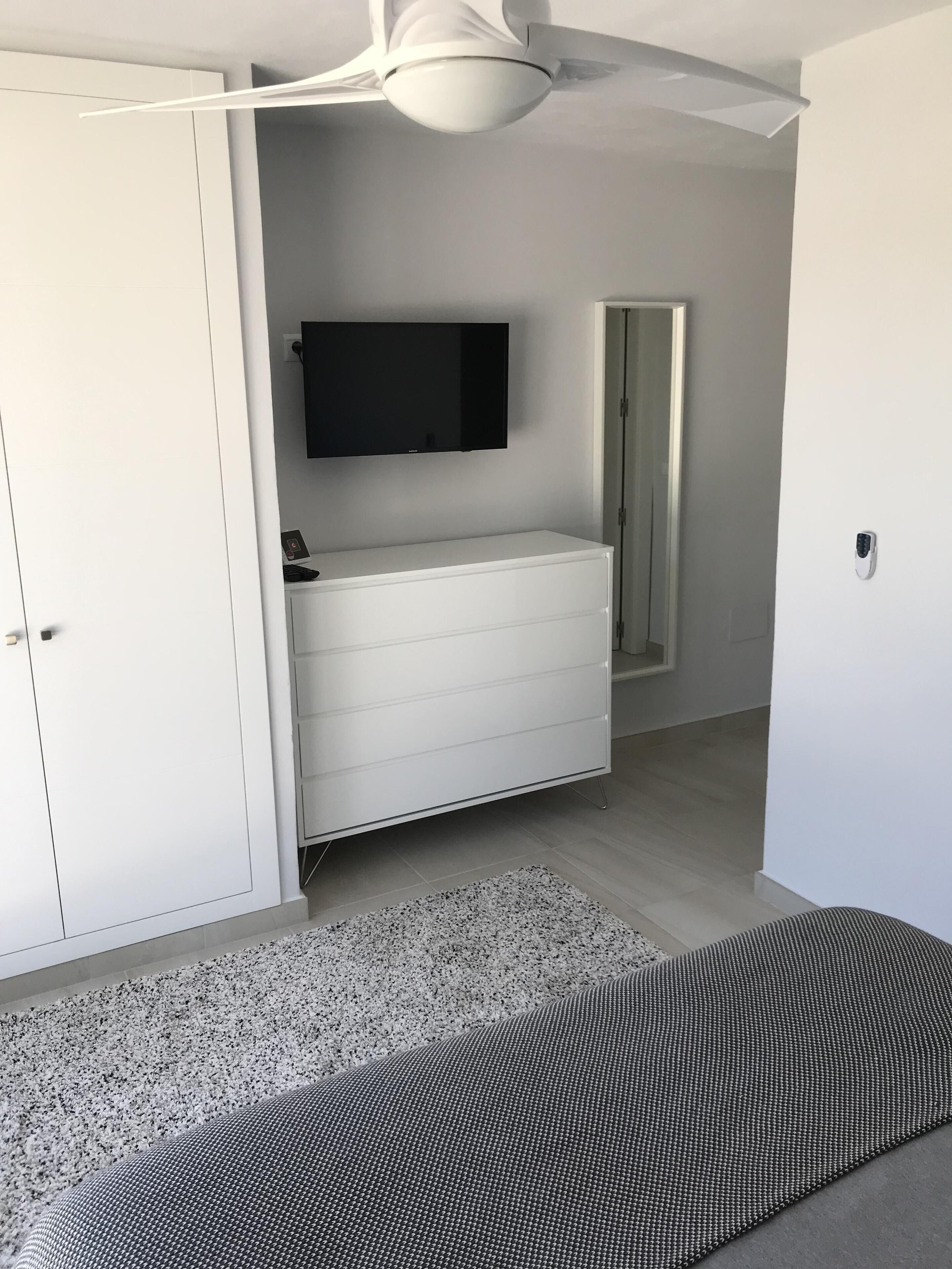 Bedroom 3 (Master) w/ Smart TV, drawers, dressing table & tall mirror