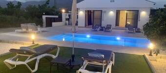 Modern luxury villa w/ stunning views, private heated pool + roof terrace