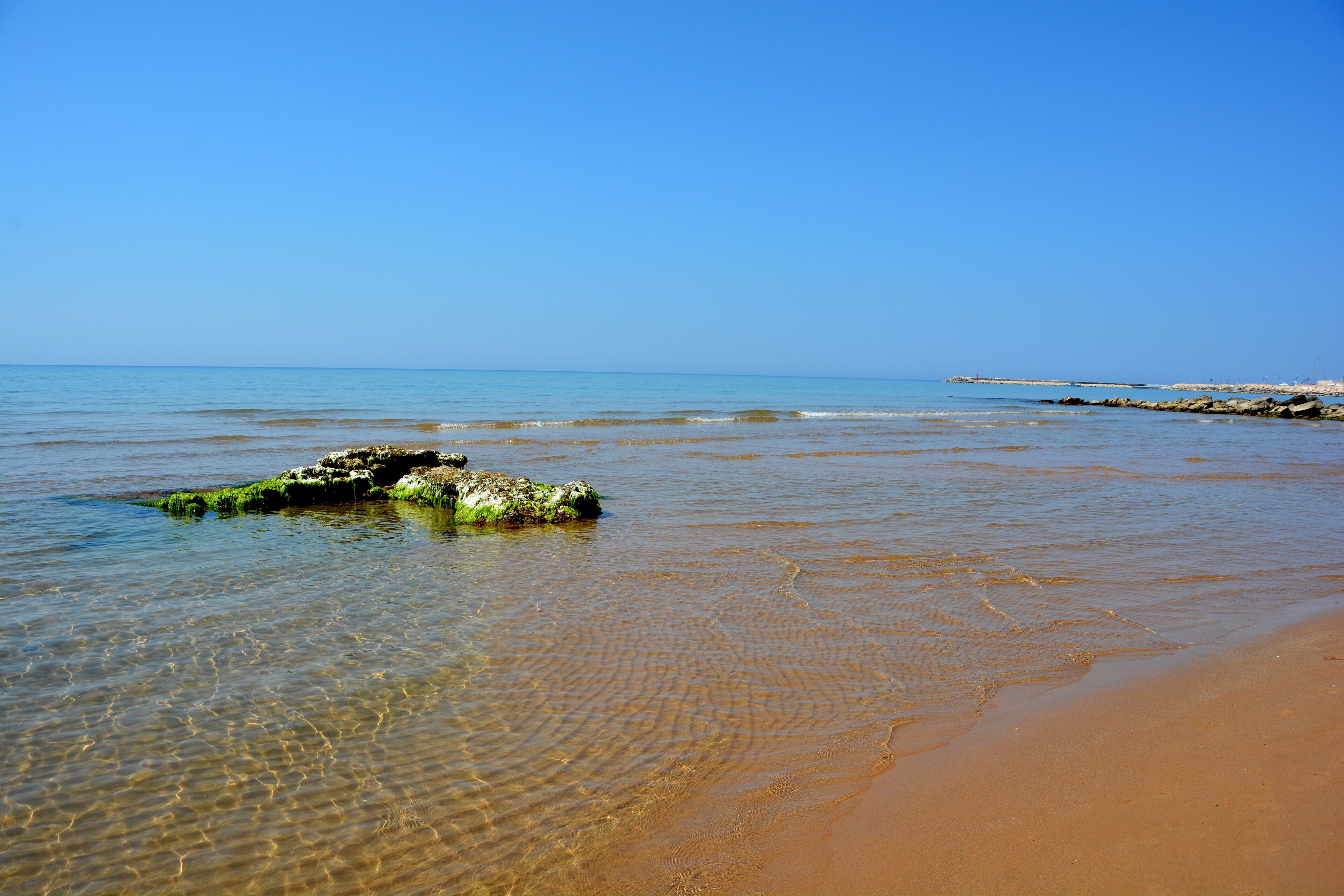 On the beach, sun loungers