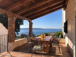 Outdoor dining - NEW! Stone house in quiet location, heated pool + sea views, ideal for familys (Zivogosce)