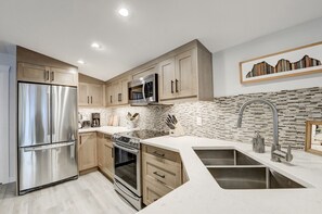 Fridge, microwave, oven, stovetop - Brand New Canmore townhome (Canmore)