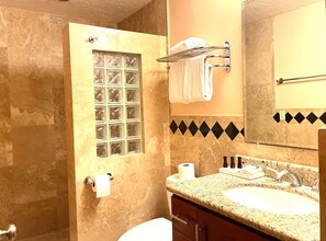 Shower, hair dryer, towels, soap