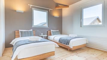 3 bedrooms, down duvets, desk, soundproofing