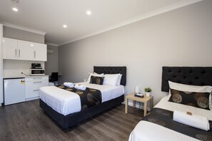Deluxe Room, Multiple Beds, Non Smoking | Living area | Flat-screen TV, DVD player - City Centre Motel (Port Pirie)