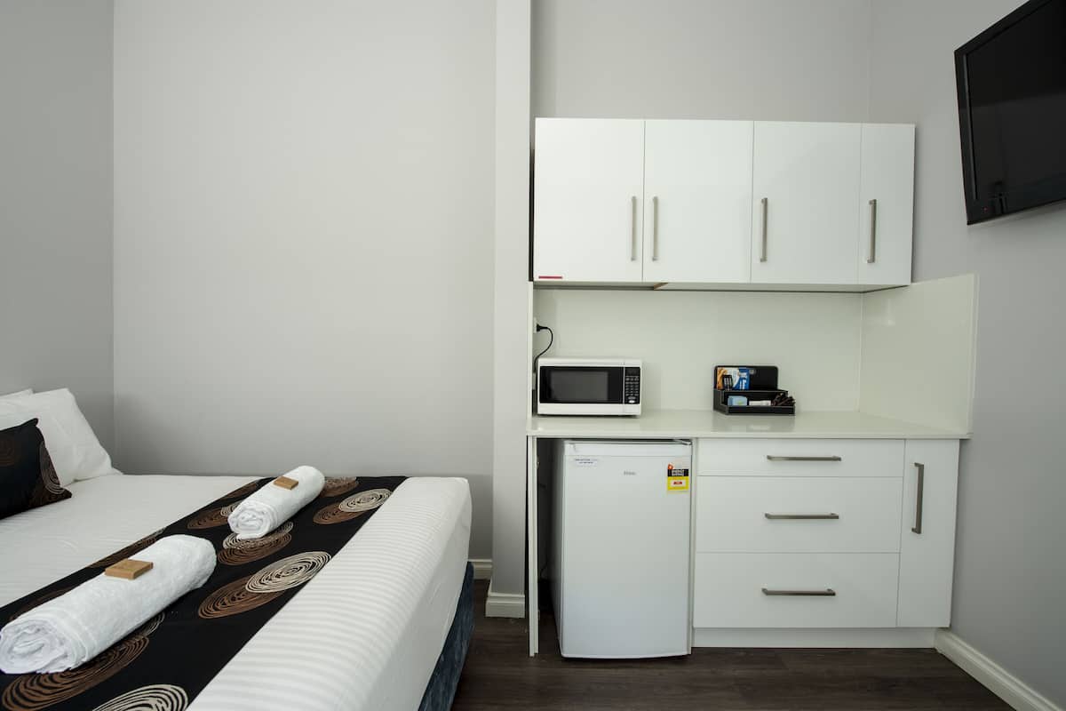 Standard Double Room, Multiple Beds, Non Smoking | Iron/ironing board, cribs (surcharge), WiFi (free), bed sheets