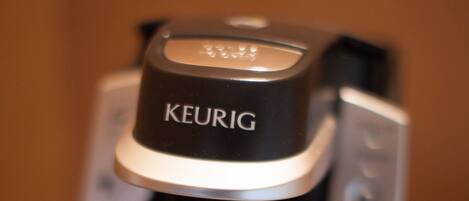 A close-up of a Keurig coffee machine.