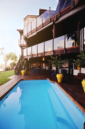 Outdoor pool, pool umbrellas, pool loungers