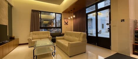 VIP Double Room | Living room | Flat-screen TV