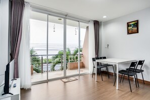 Superior Double Room | Living area | Flat-screen TV - KM Condo Seaside (Pranburi)