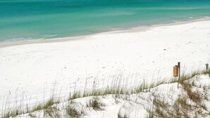 A beach with white sand and clear turquoise water. - New construction, custom decorated, chic and spacious Seacrest home, sleeps 14 (Rosemary Beach)