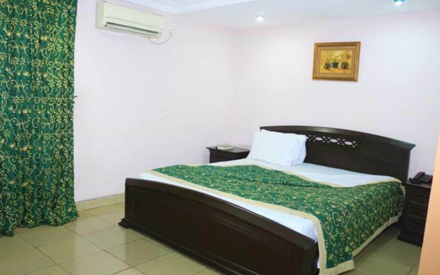 Basic Room, 1 Queen Bed, Non Smoking | Minibar, individually furnished, desk, blackout drapes