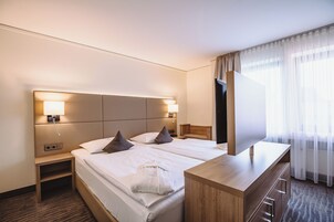 Hypo-allergenic bedding, in-room safe, desk, laptop workspace