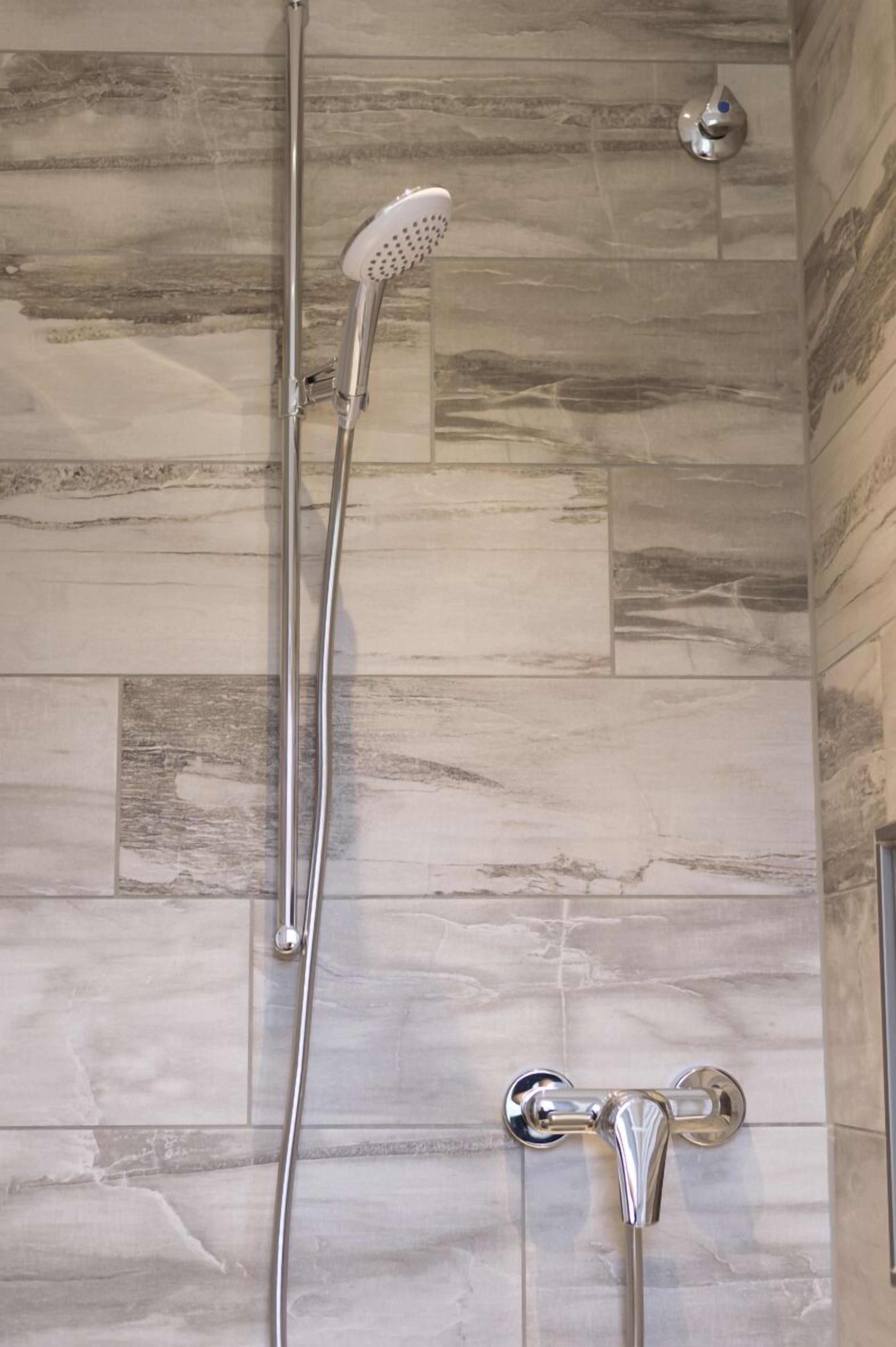 double room, 1 king bed, non smoking, garden view | bathroom shower