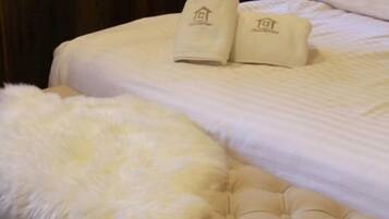 Egyptian cotton sheets, premium bedding, blackout drapes, soundproofing