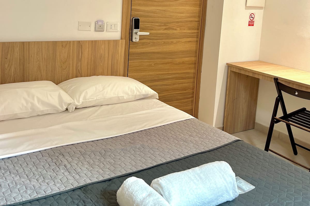 Desk, blackout drapes, WiFi (free), bed sheets