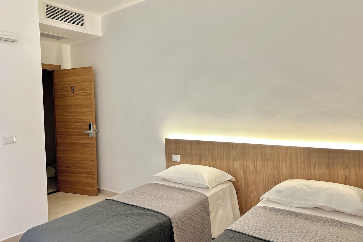 Desk, blackout drapes, WiFi (free), bed sheets