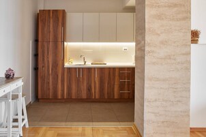 Luxury Apartment, 1 Bedroom, City View | Private kitchen | Full-size fridge, oven, stovetop, electric kettle