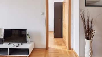 Deluxe Apartment, 1 King Bed with Sofa bed, City View | Living area | 40-inch LCD TV with cable channels, TV