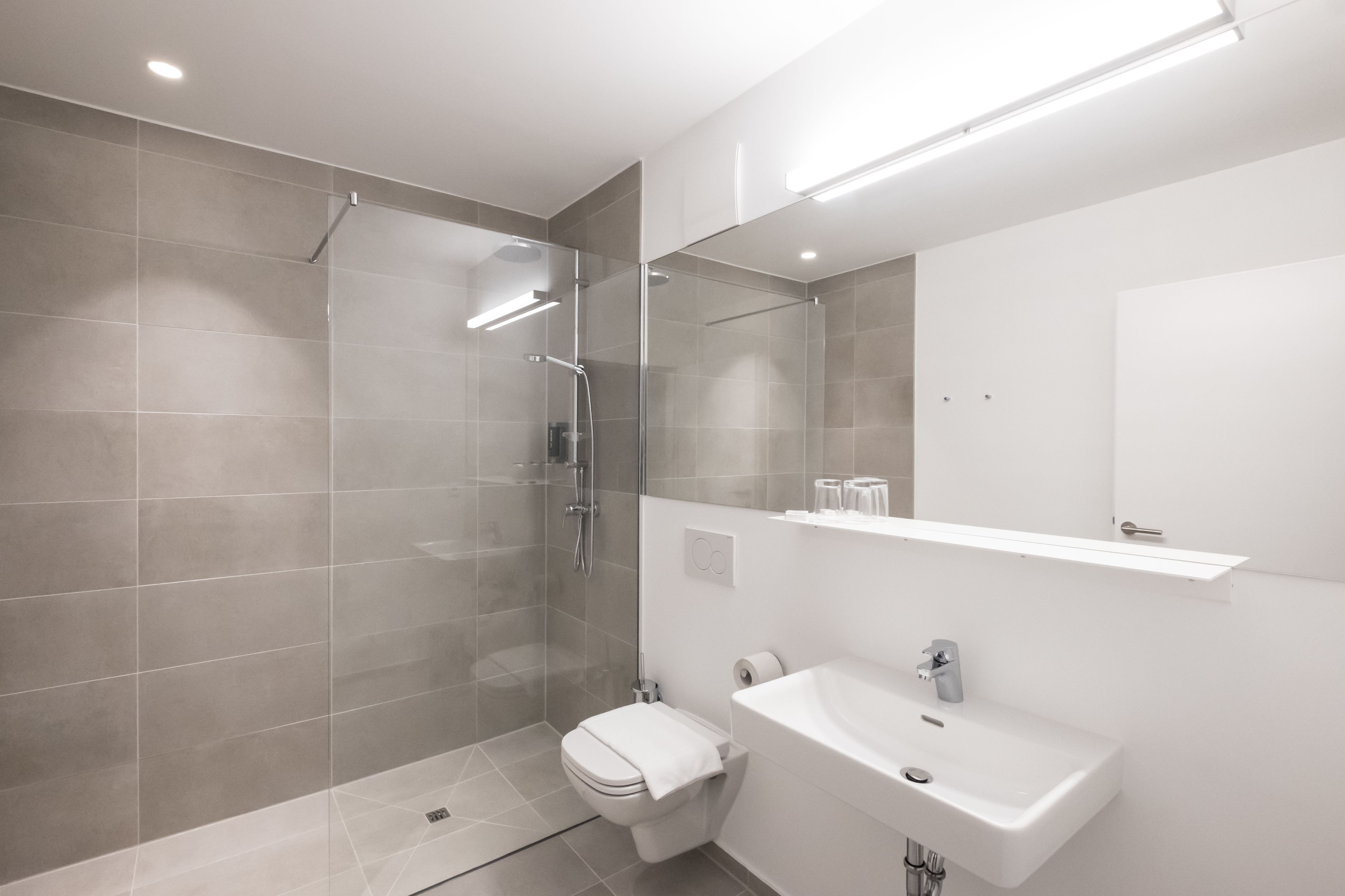 classic double room | bathroom | shower, hair dryer, towels