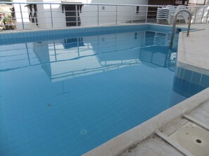 Outdoor pool, pool umbrellas, pool loungers