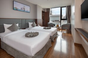 Family Superior City View | Premium bedding, minibar, in-room safe, blackout drapes