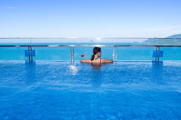 Outdoor pool, open 6:00 AM to 9:00 PM, sun loungers
