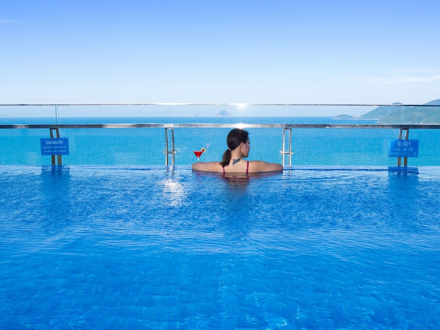 Outdoor pool, open 6:00 AM to 9:00 PM, sun loungers