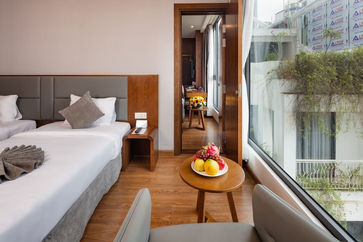 family deluxe, city view | 2 bedrooms, premium bedding, minibar, in-room safe