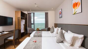 Deluxe Room, Ocean View | Premium bedding, minibar, in-room safe, blackout drapes