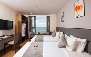 Deluxe Room, Ocean View | Premium bedding, minibar, in-room safe, blackout drapes