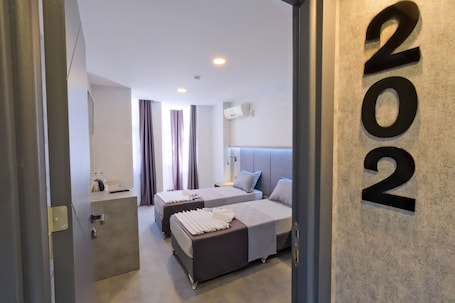 Egyptian cotton sheets, premium bedding, minibar, in-room safe