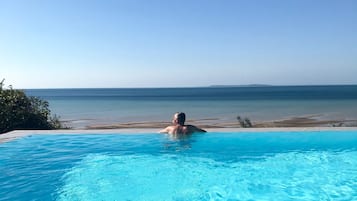6 outdoor pools, pool umbrellas, pool loungers