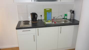 Junior Suite (incl. cleaning fee 30 EUR) | Private kitchenette | Stovetop, cookware/dishes/utensils