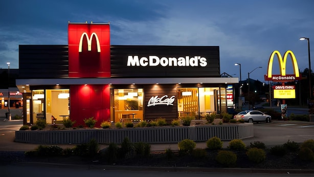 A McDonald's restaurant with a drive-thru and a McCafé. - Natol Hotel (Kuching)