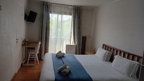 Desk, blackout curtains, free WiFi, bed sheets