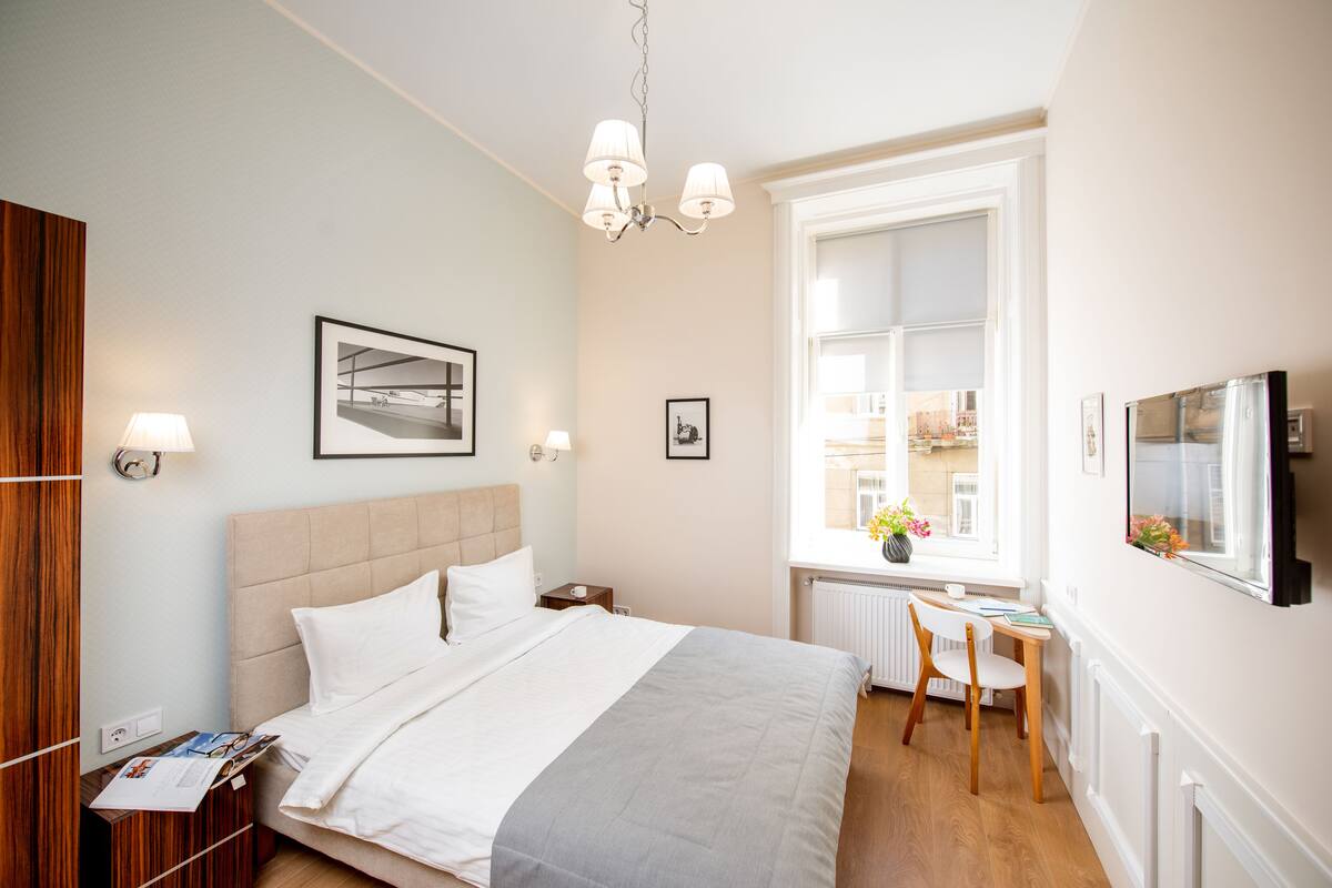 1 bedroom, premium bedding, blackout curtains, soundproofing