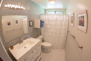Combined shower/bathtub, hair dryer, towels, soap