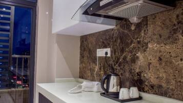 Deluxe Double Room | Private kitchen | Fridge, stovetop, electric kettle