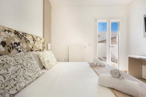 Family Apartment, 1 Bedroom (Ground Floor - 1051) | 1 bedroom, in-room safe, free WiFi, bed sheets - Absolute Suite Apartments (Porto Cesareo)