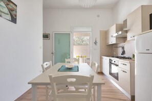 Comfort Apartment, 2 Bedrooms (1183) | Private kitchen | Full-size fridge, oven, stovetop, cookware/dishes/utensils