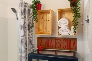 Hair dryer, towels, soap, shampoo