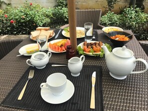 Daily cooked-to-order breakfast (USD 8 per person)