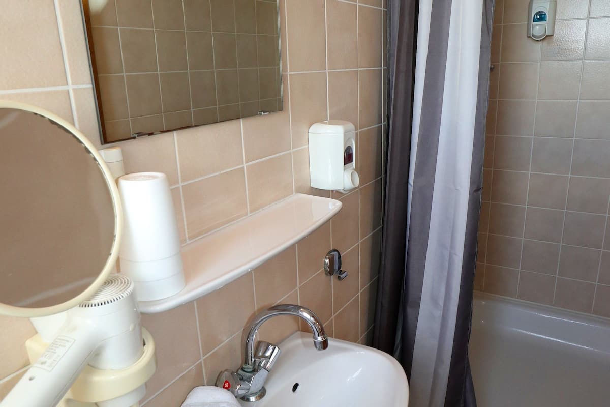 triple room | bathroom sink