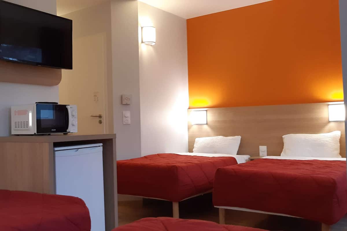 Premium bedding, individually furnished, desk, laptop workspace