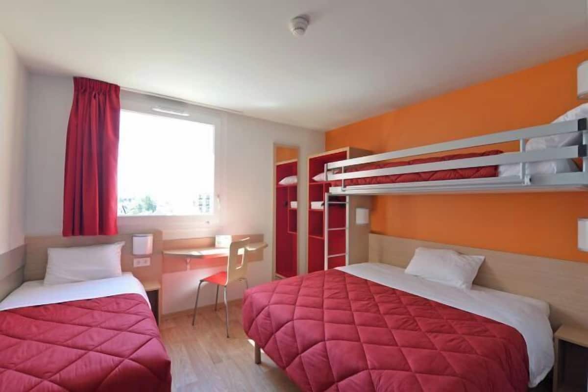Premium bedding, individually furnished, desk, laptop workspace