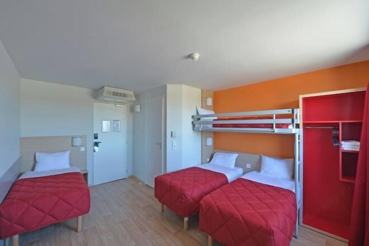 Premium bedding, individually furnished, desk, laptop workspace