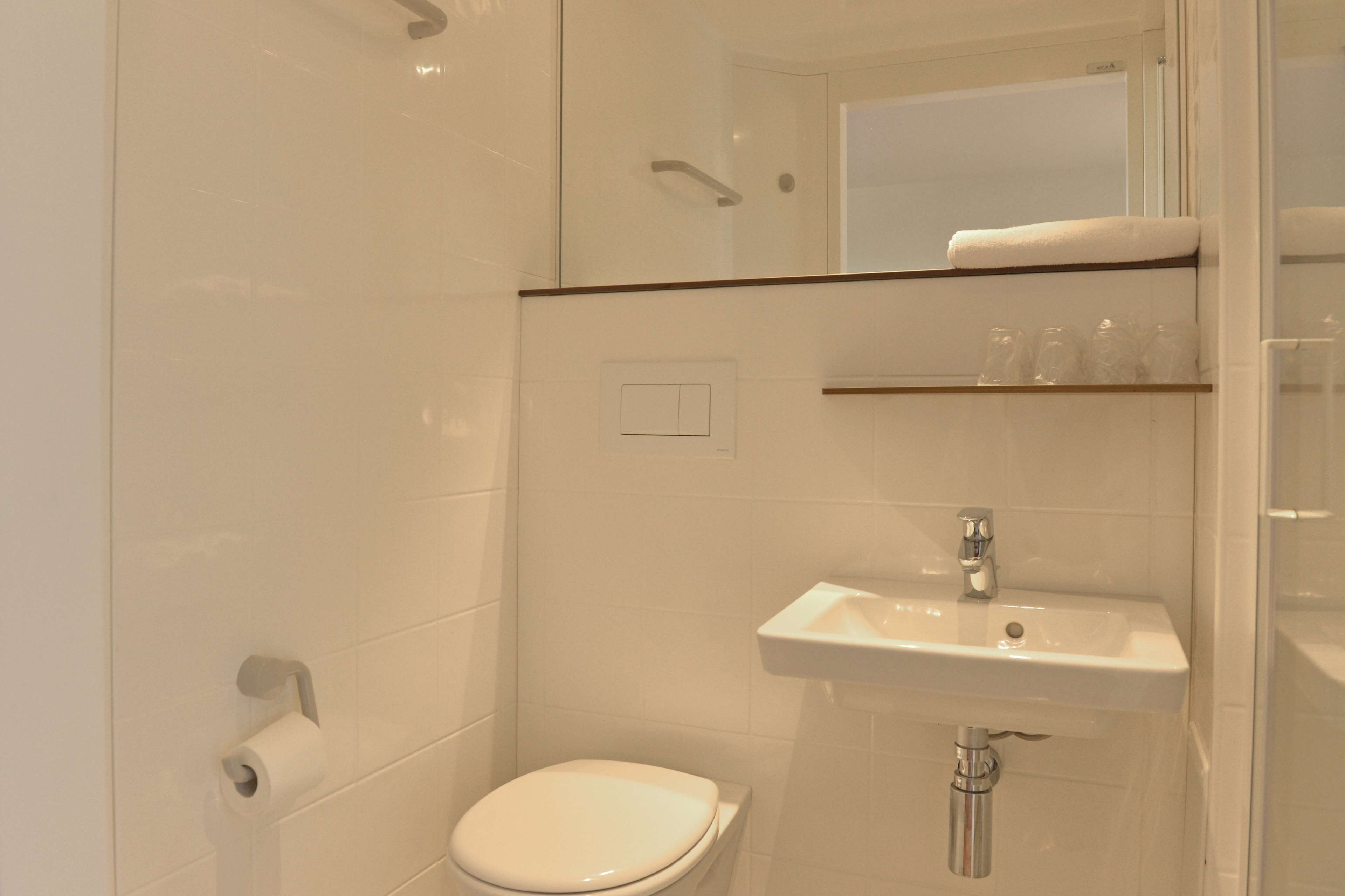 shower, eco-friendly toiletries, towels